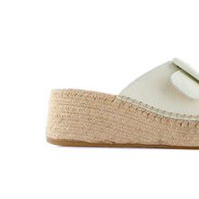 Load image into Gallery viewer, Close-up of a sandal with a textured sole on a white background
